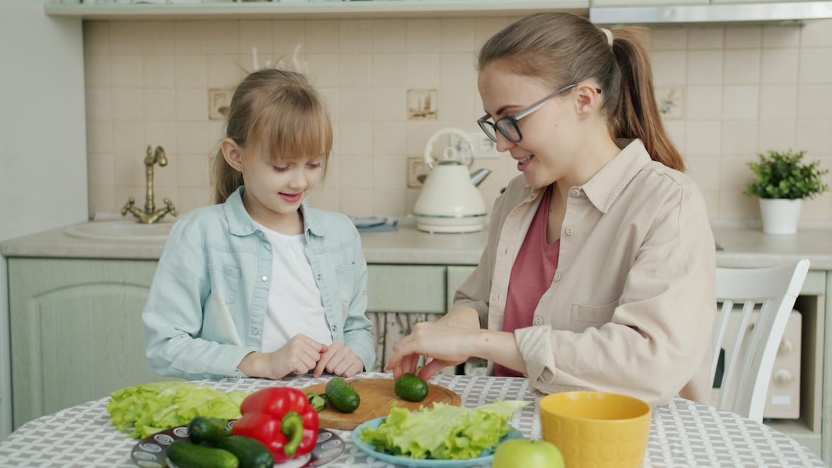 Family cooking together in a bright kitchen